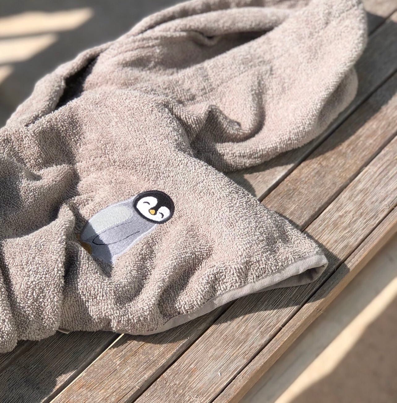 Badponcho 50x50 - Pinguïn